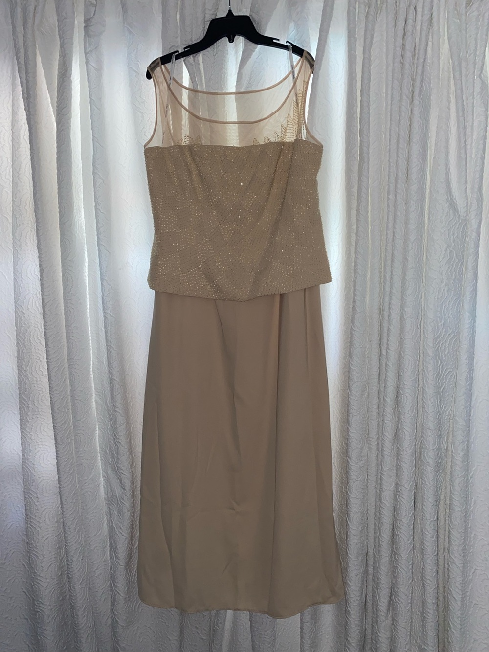 Beige Sleeveless Maxi Dress with Sheer Neckline and Embellished Bodice